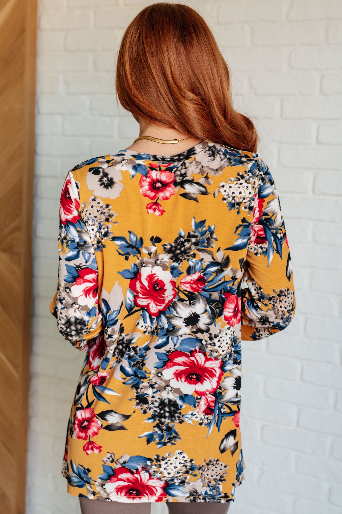 V-Neck Scoop Hem Top in Marigold Floral at Curbside Boutique