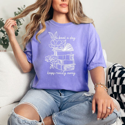 A Book A Day Graphic Tee  at Curbside Boutique