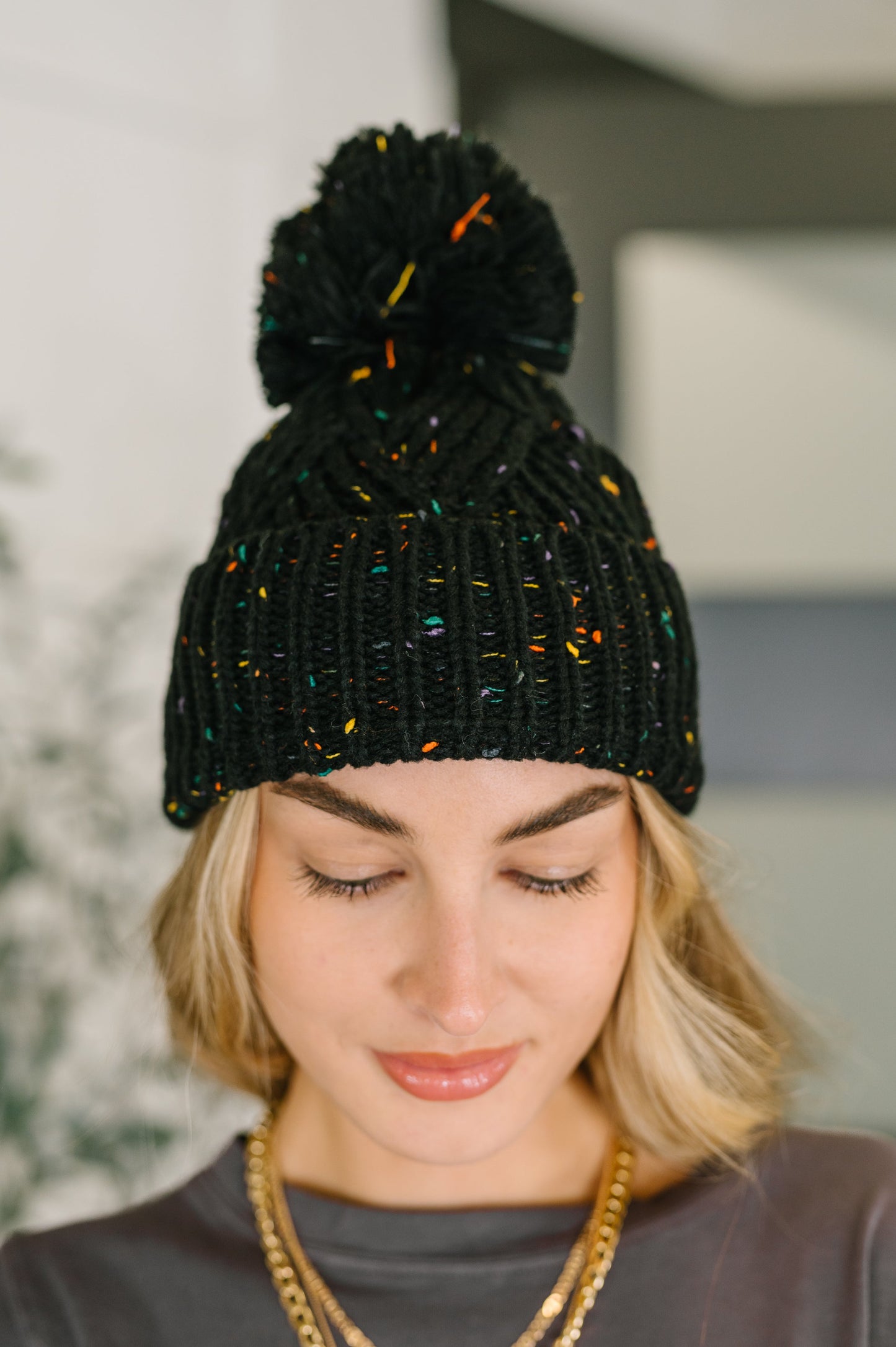 Cover Your Ears Pom Pom Beanie in Black at Curbside Boutique