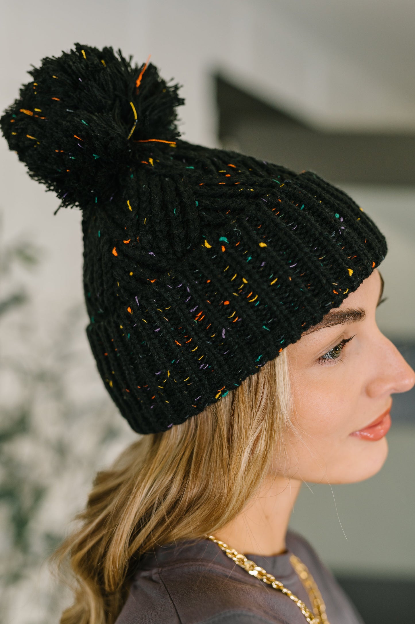 Cover Your Ears Pom Pom Beanie in Black at Curbside Boutique