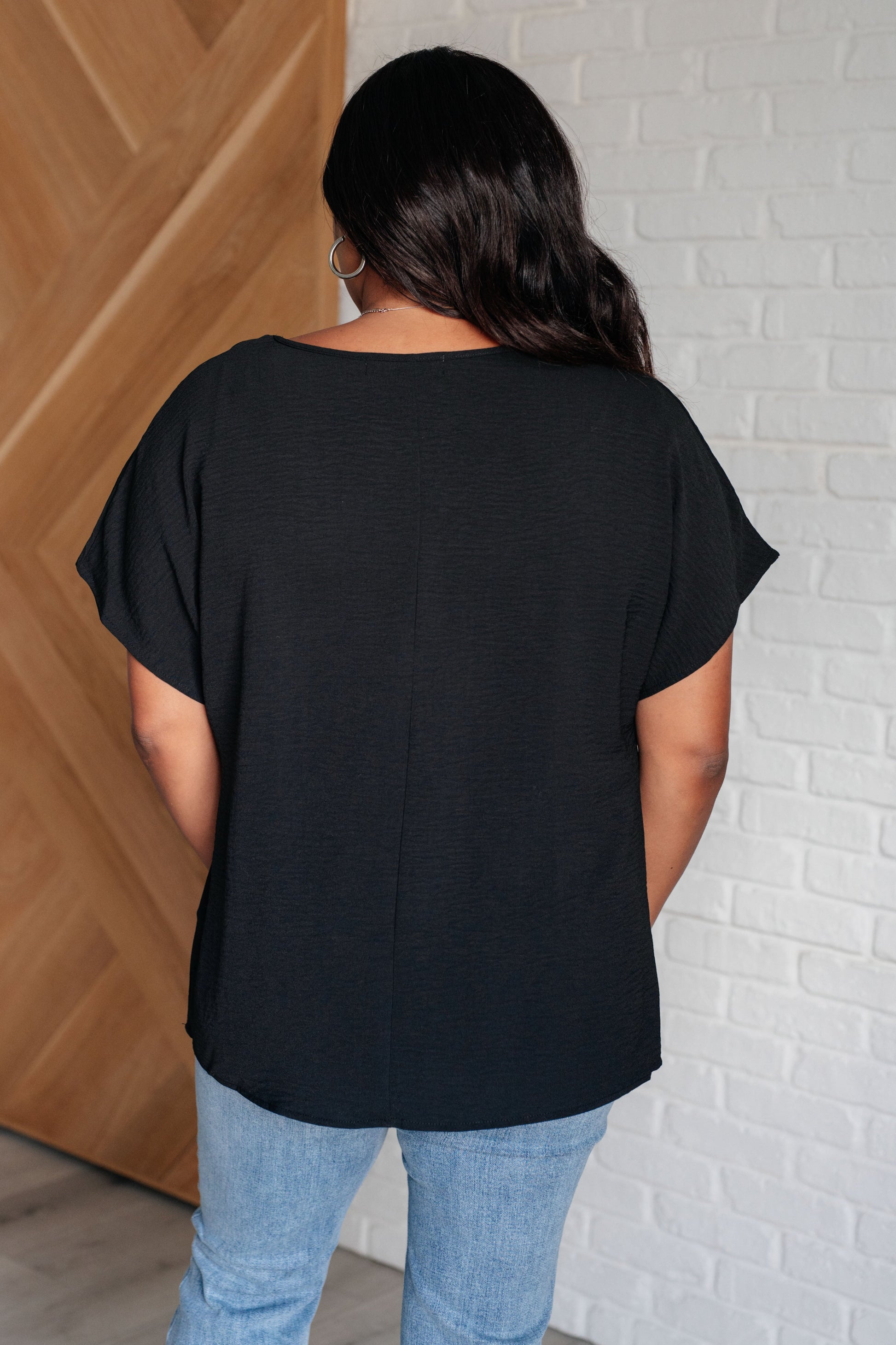 Frequently Asked Questions V-Neck Top in Black at Curbside Boutique