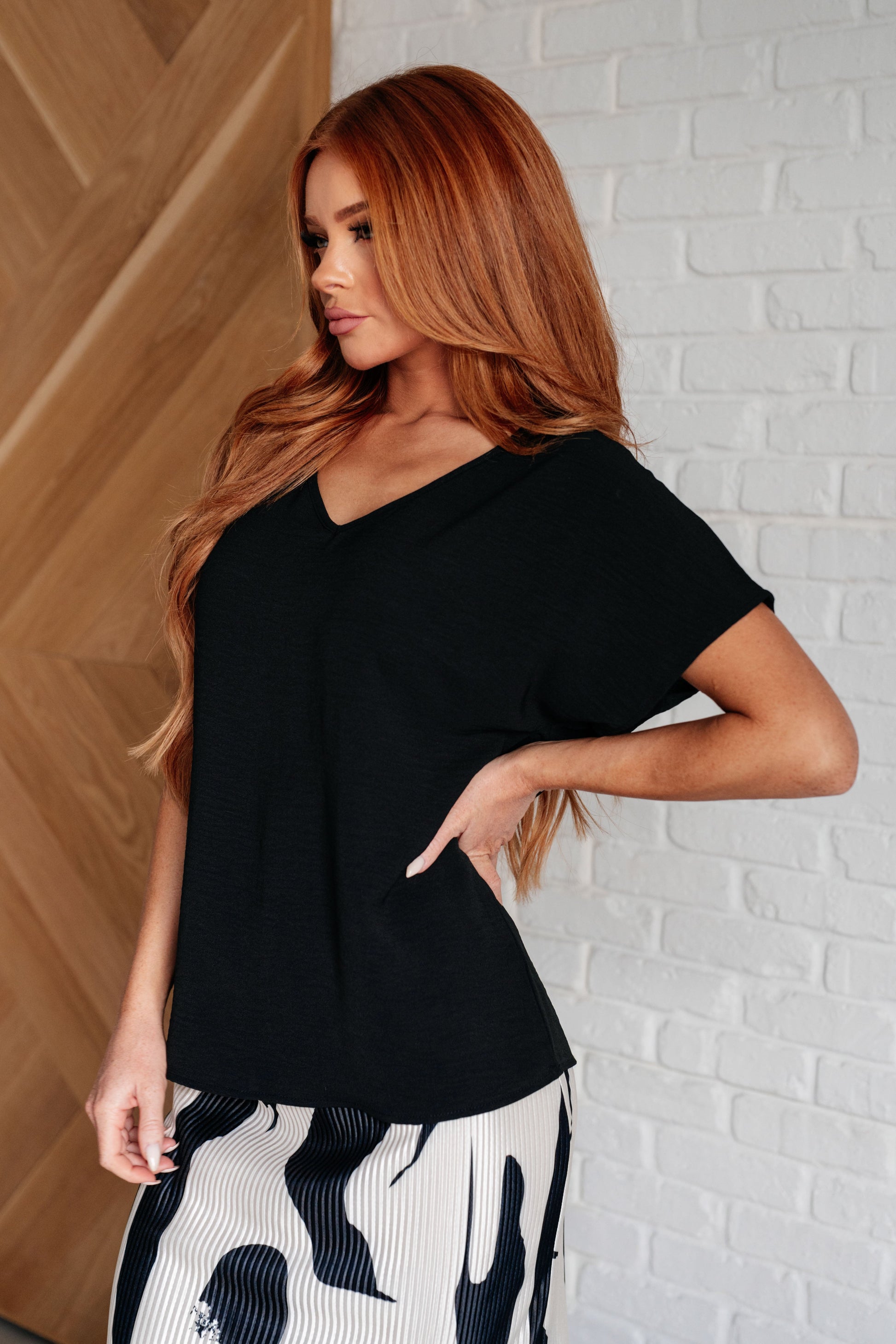Frequently Asked Questions V-Neck Top in Black at Curbside Boutique