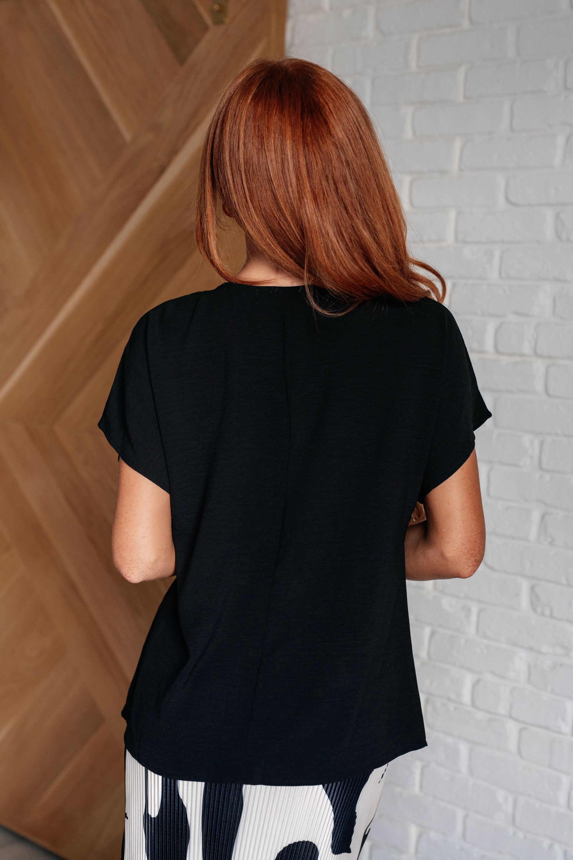 Frequently Asked Questions V-Neck Top in Black at Curbside Boutique