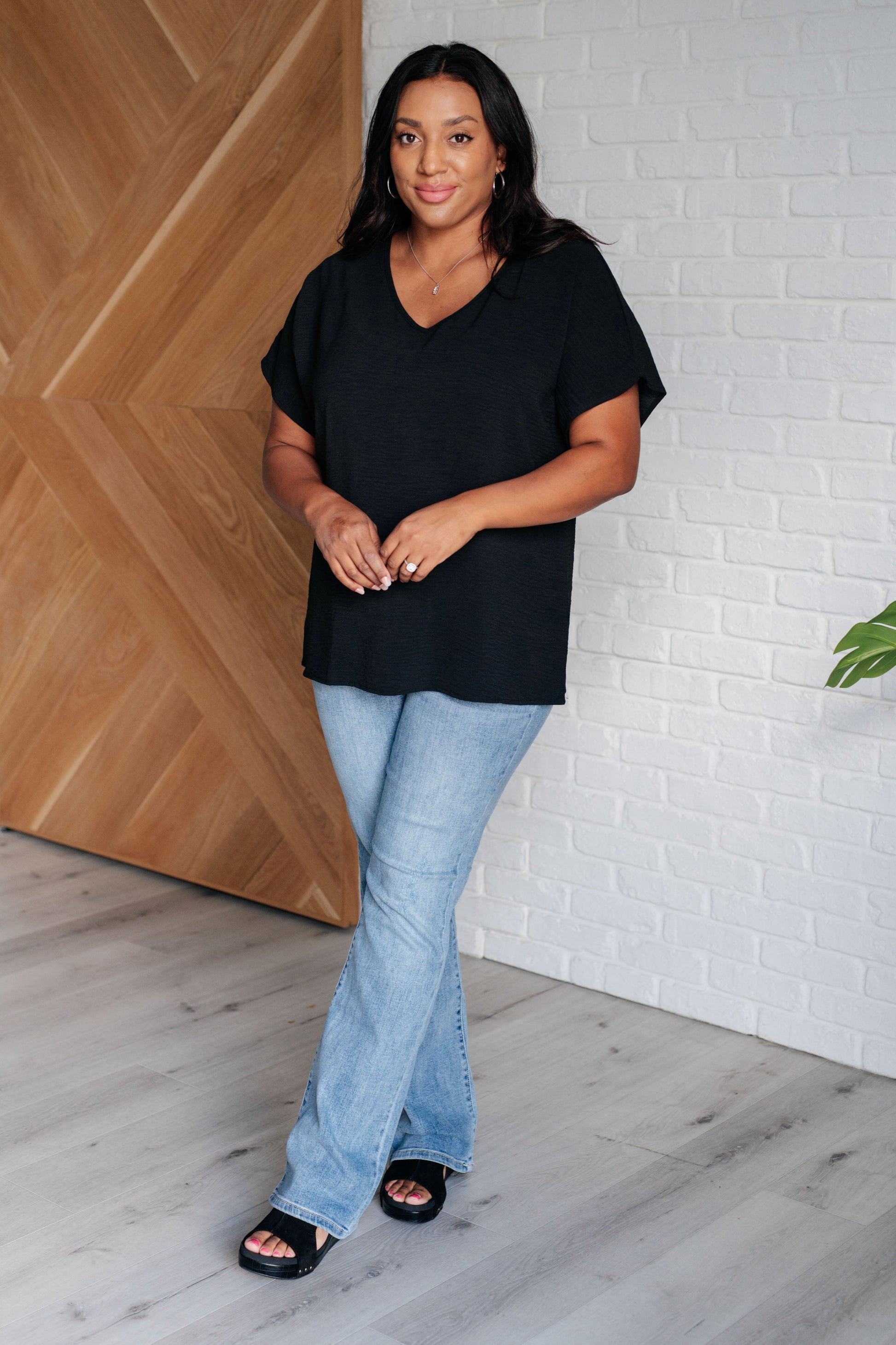 Frequently Asked Questions V-Neck Top in Black at Curbside Boutique