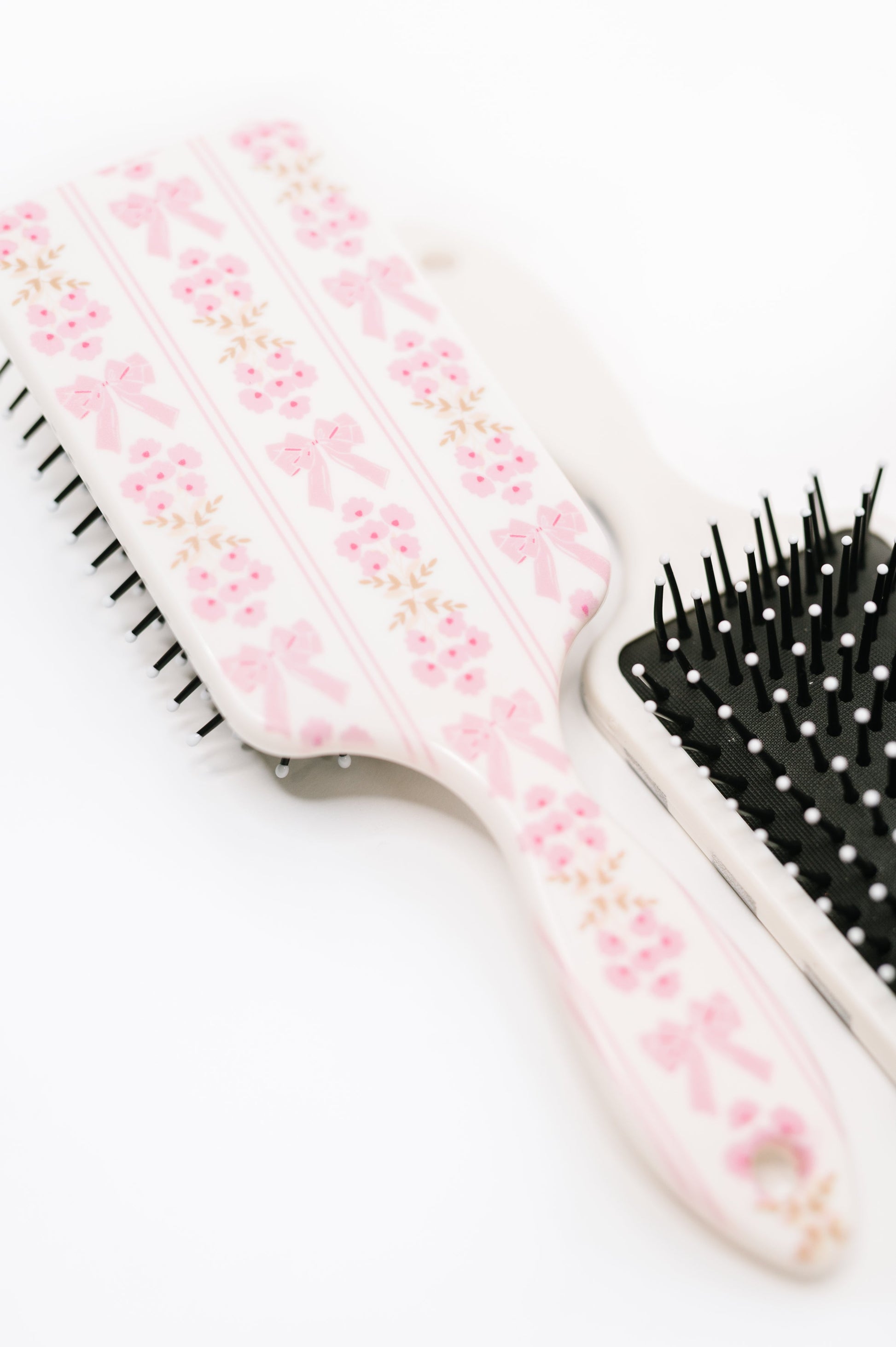 Girly Girl Bow and Floral Hair Brush at Curbside Boutique