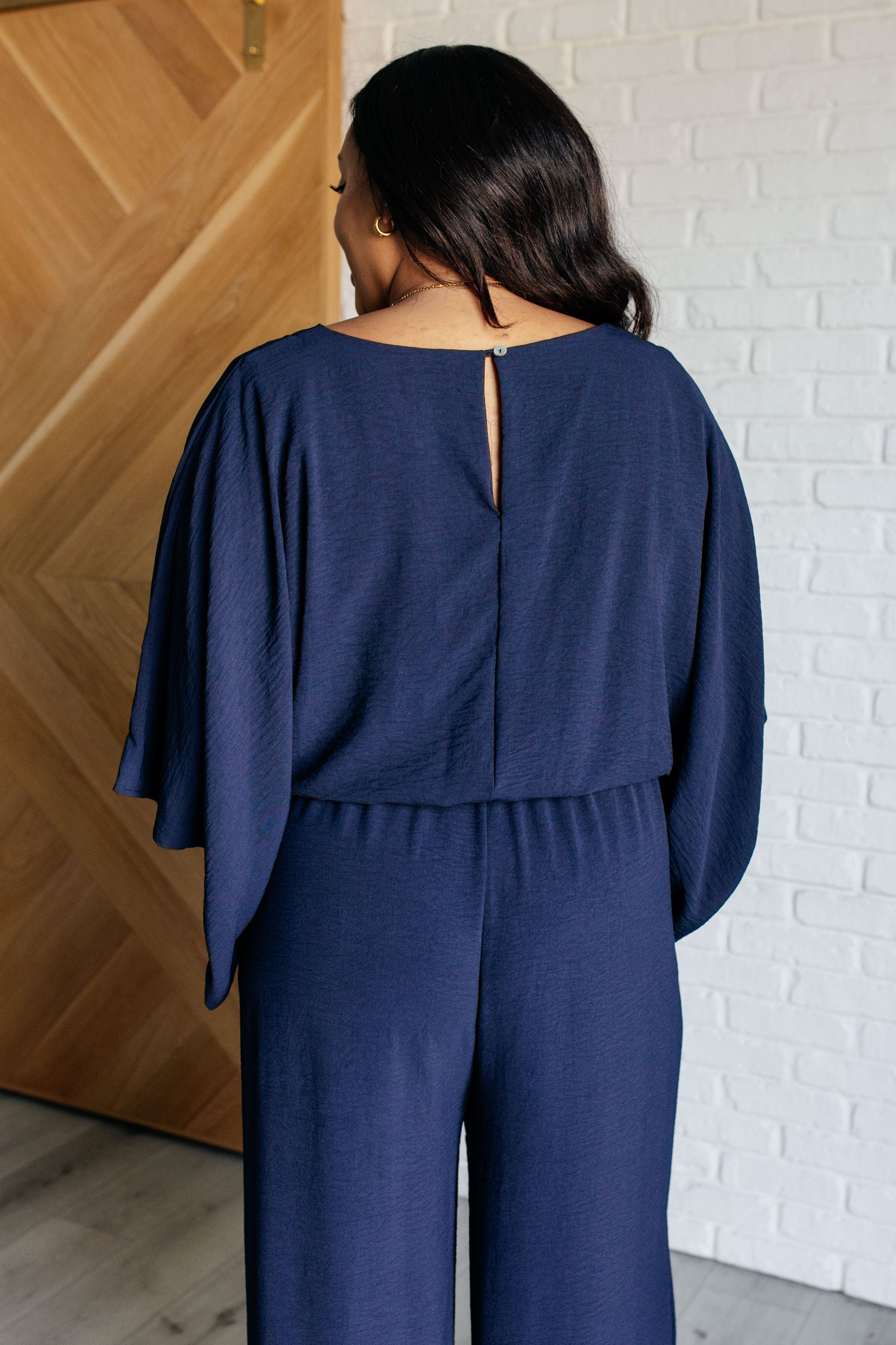 Up to Something Wide Leg Jumpsuit at Curbside Boutique